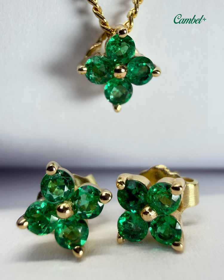 Foto de alta joyería: Set flor en oro amarillo de 18k con 12 esmeraldas colombianas naturales cambel