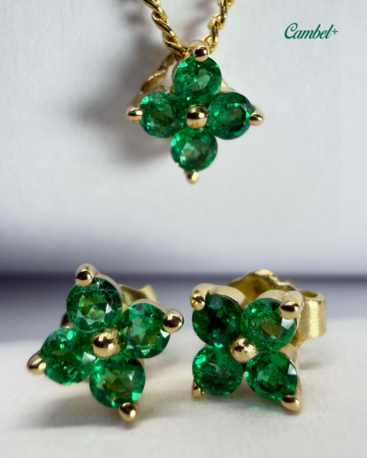 Foto de alta joyería: Set flor en oro amarillo de 18k con 12 esmeraldas colombianas naturales cambel